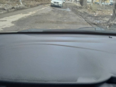 В Авиаторе дорогу ада засыпали асфальтной крошкой