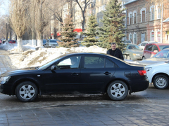 Чиновники и депутаты приехали на актив Саратова на Грантах и иномарках