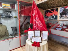 В Энгельсский дом-интернат на вечное хранение передали копию Знамени Победы